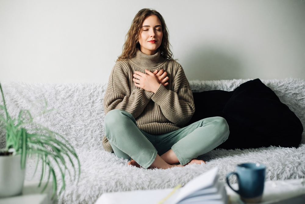 woman practicing breathing exercises